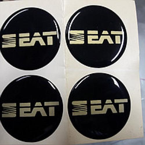 Наклейки на колпаки, диам. 60 мм "SEAT" черные (4 шт)